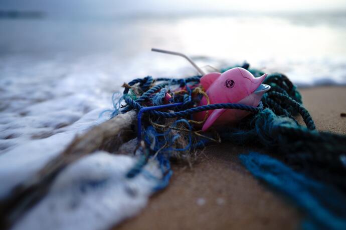Plastic and abandoned fishing gear at the beach