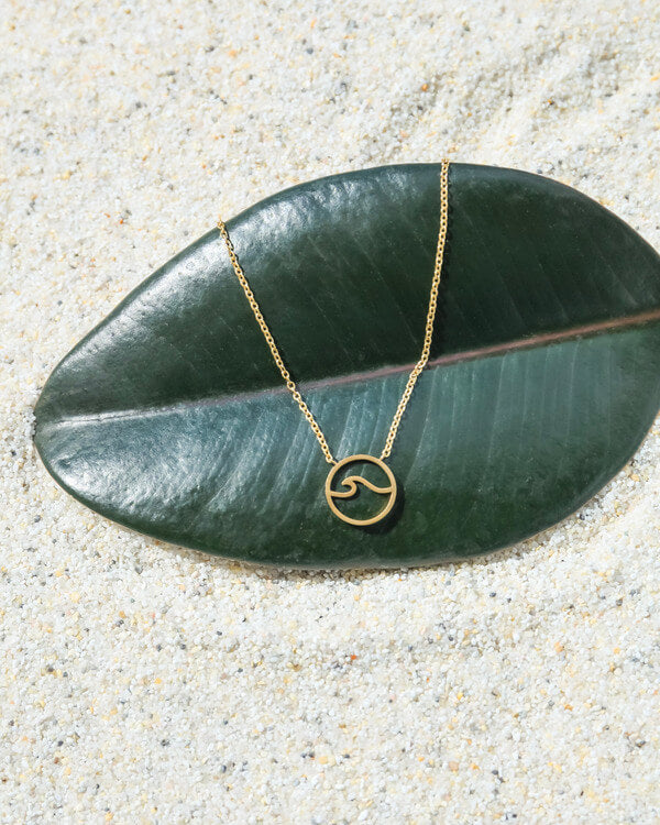 Oceanness eco ocean wave necklace in gold and stainless steel